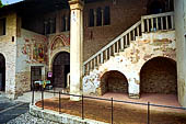 Sesto al Reghena (Pn). Abbazia di Santa Maria in Silvis. La semplice facciata della chiesa, a destra una scala balaustrata conduce all'antico coro notturno dei monaci. 